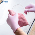 White disposable nitrile medical examination gloves